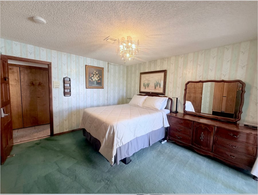 Private second bedroom with a queen bed, spacious closet, full dresser storage, easy to access to its own private bathroom.