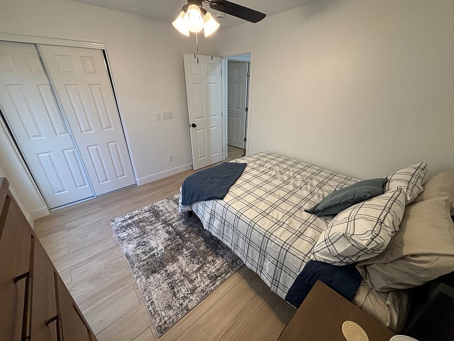 Bedroom 3 has queen bed, smart tv, dressers, closet and all the quality bedding of home