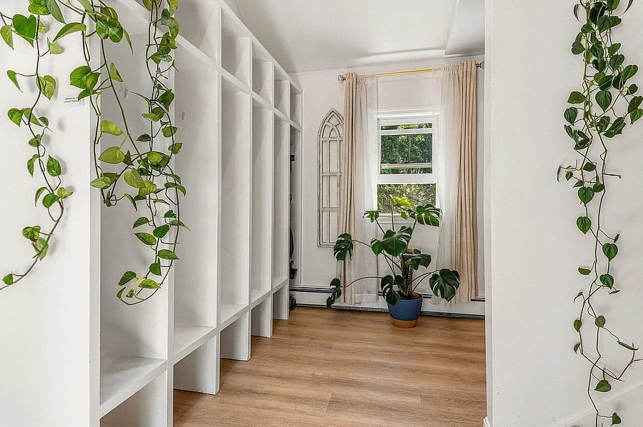 Only this mudroom/ laundry space which has locked doors on either side can be utilized by both sides.