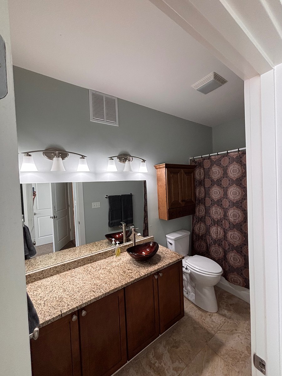 Downstairs full bath in master.