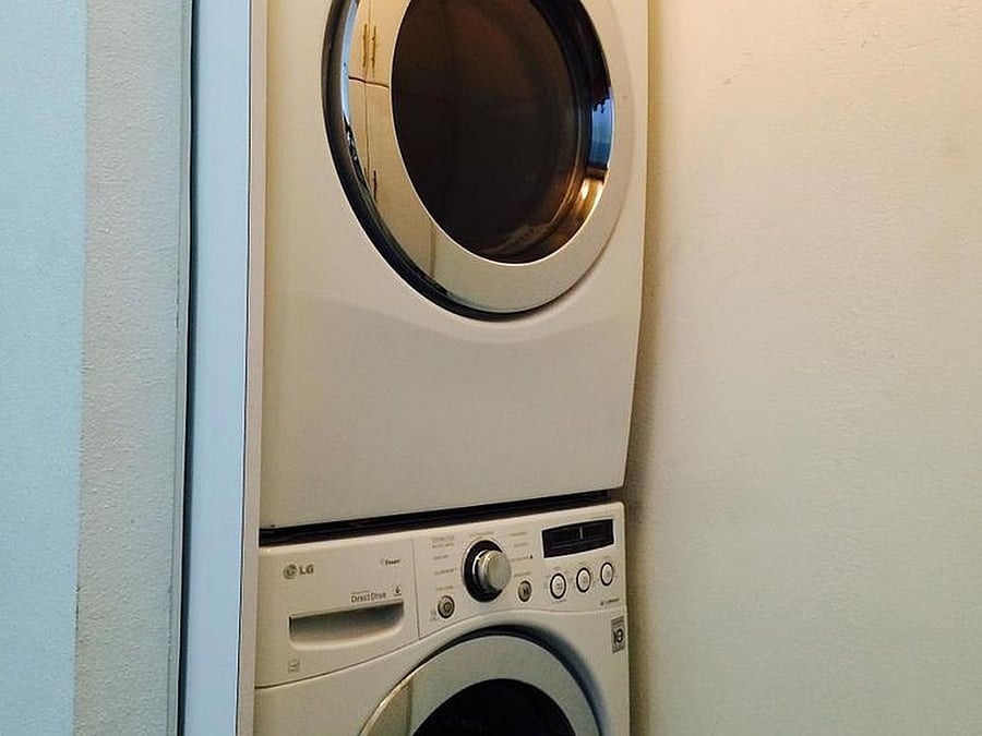 In-unit shared stackable washer and dryer for your convenience