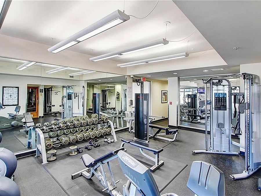 Resort-style building amenities including a 24-hour fitness center