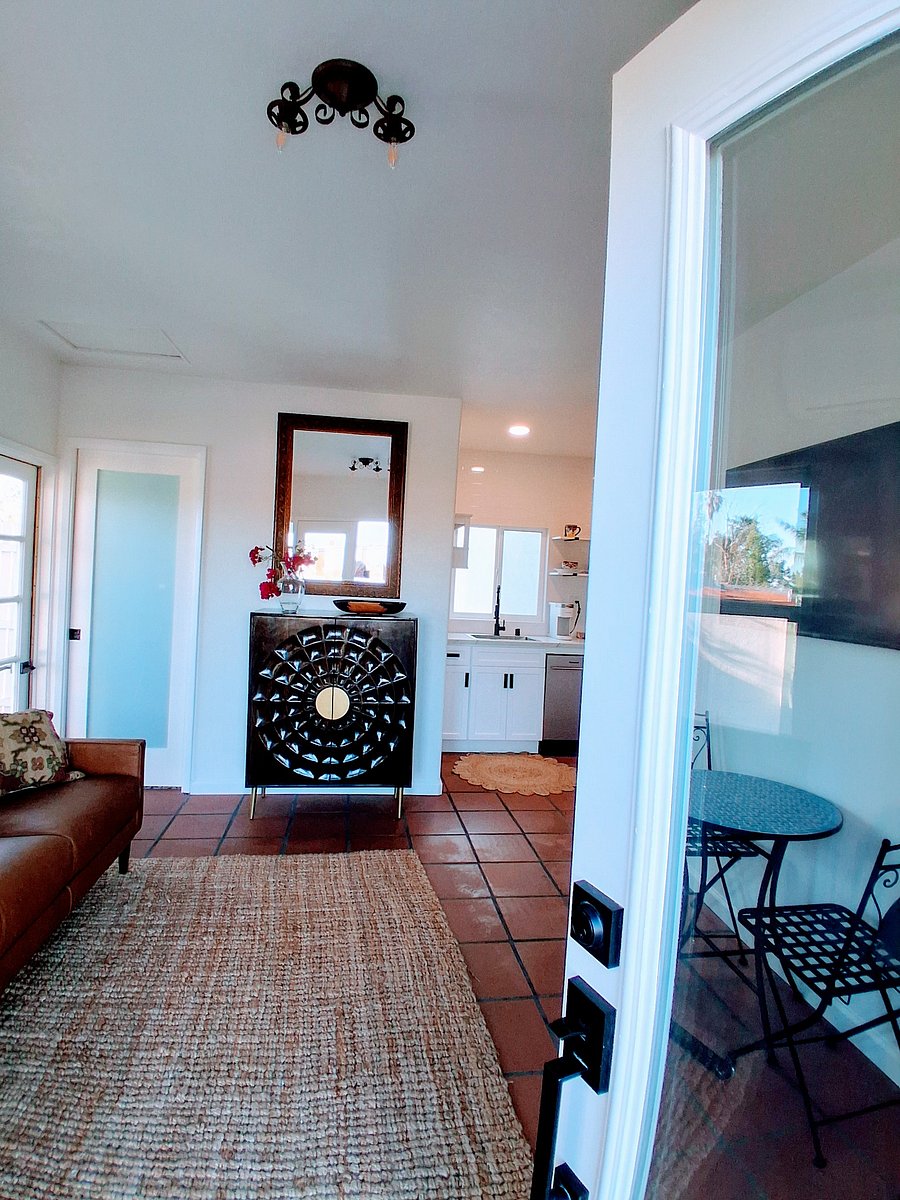 Higher ceilings, designer furniture with storage space. Lots of natural light.
Single light pocket door goes to the bathroom.