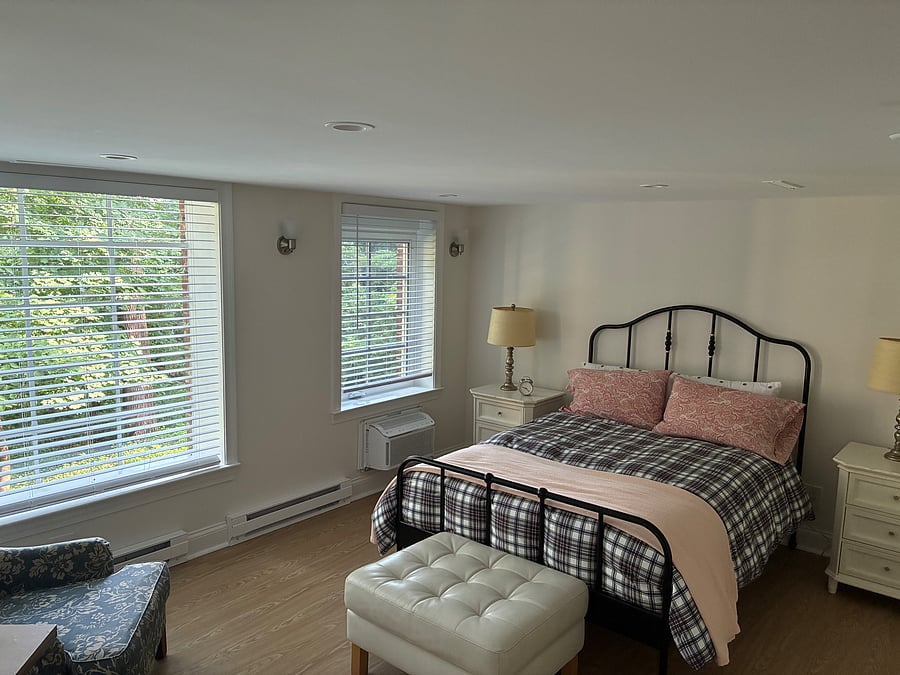 Spacious bedroom overlooking tranquil wooded yard with stream. Full size bed. Two spacious closets.