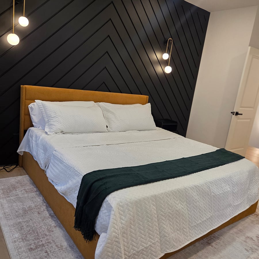 King bedroom:
"Unwind in the spacious king bedroom-your comfortable retreat after a full day exploring Houston."