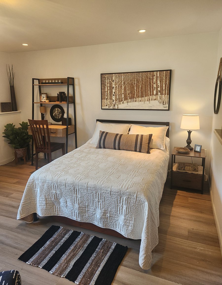 Touch lamp next to the bed. Nightstand with storage.