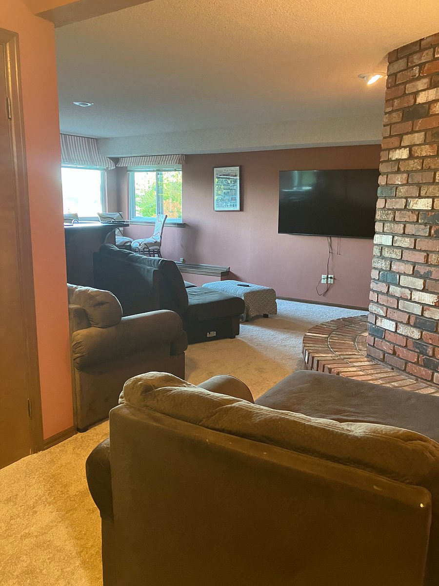 Big views out lower level. TV room, big bar area with fridge and microwave. huge fireplace.