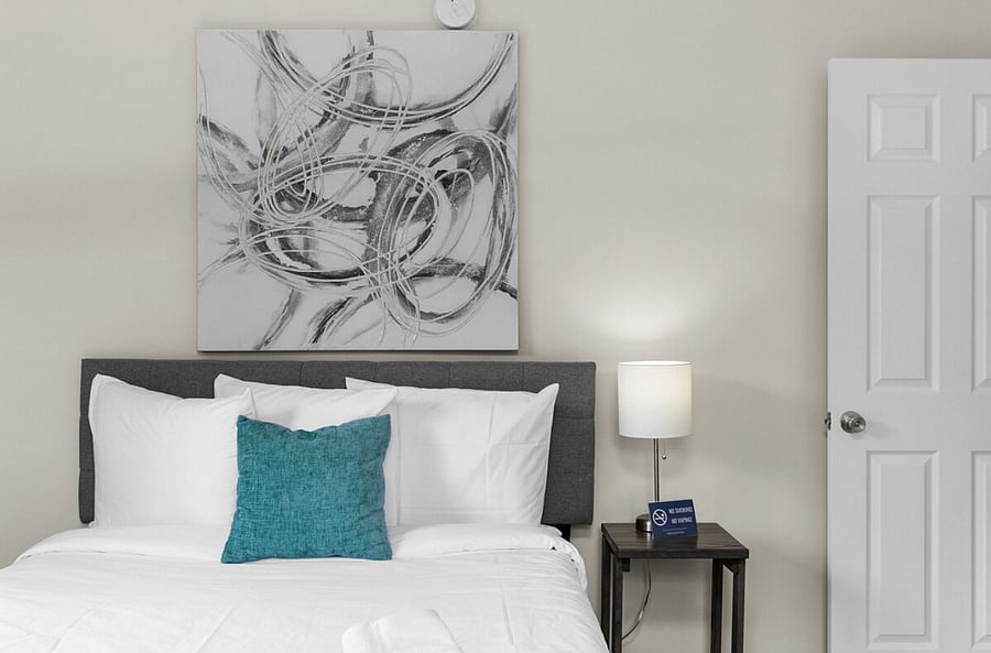 Recharge in a comfortable full-size bed, with a simple, welcoming setup that makes it easy to feel right at home.