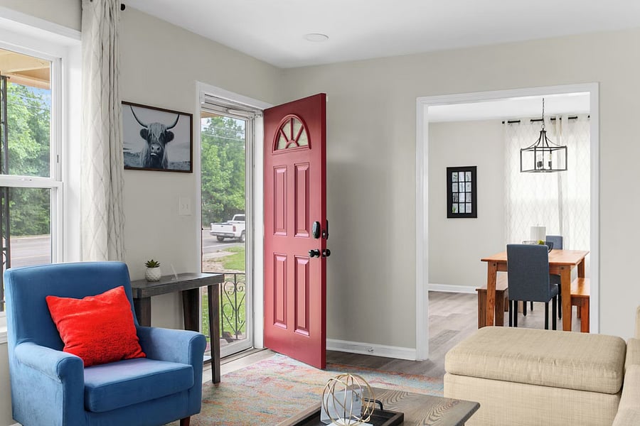 Step inside and walk straight into a bright, welcoming living room filled with natural light-setting the tone for a comfortable, relaxing stay from the moment you arrive.