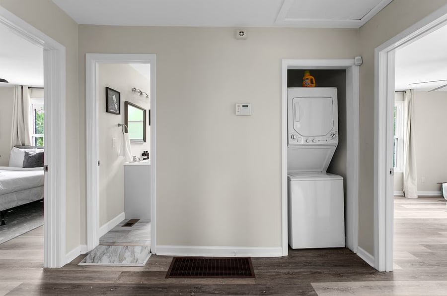Tucked neatly into the hallway, the stackable washer and dryer make it easy to keep up with laundry during your stay-convenient, efficient, and right where you need it.