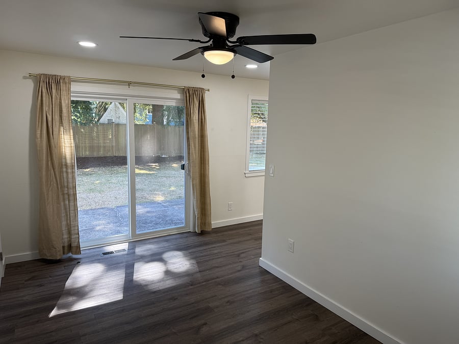 Dining Room with sliding glass door to back yard patio.