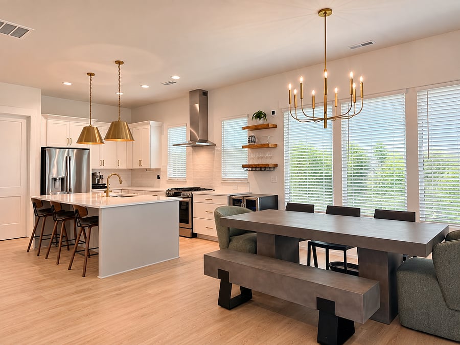 Open kitchen and dining area with abundant natural light
