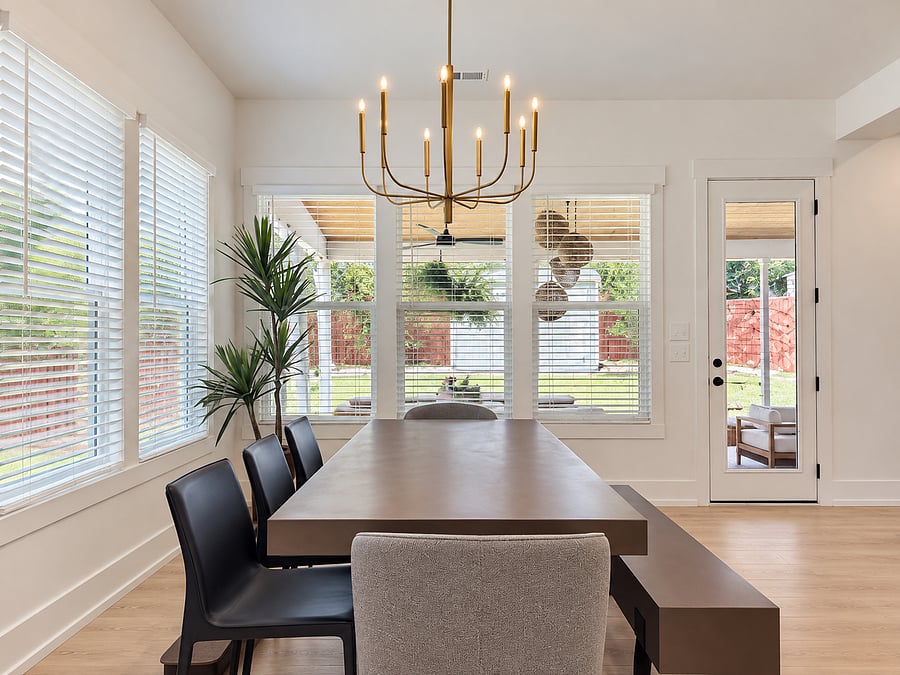 Dining area overlooking the backyard and covered patio