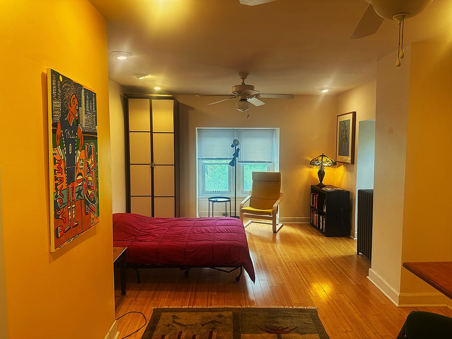 View of the studio from the door of the bathroom.