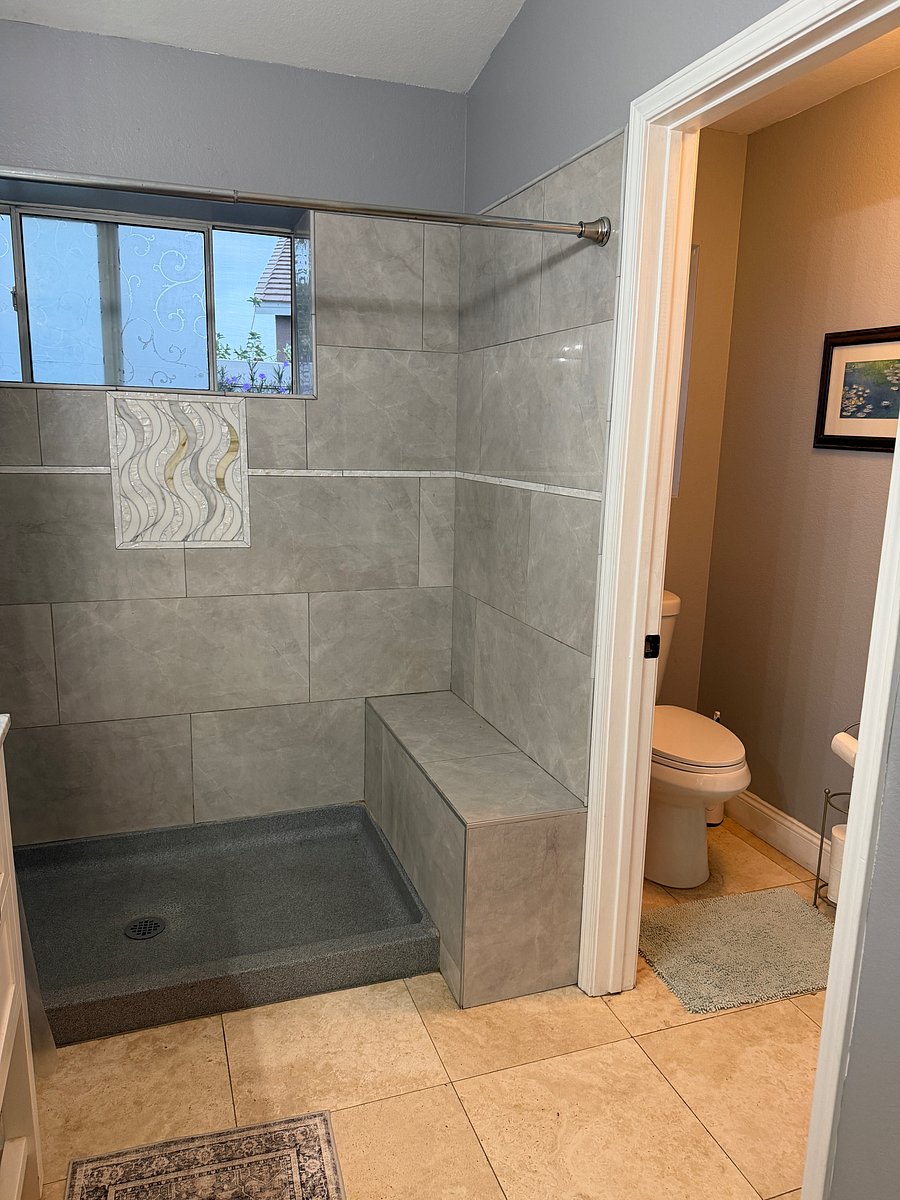 Full walk-in shower and the toilet has its own room with door and lock.