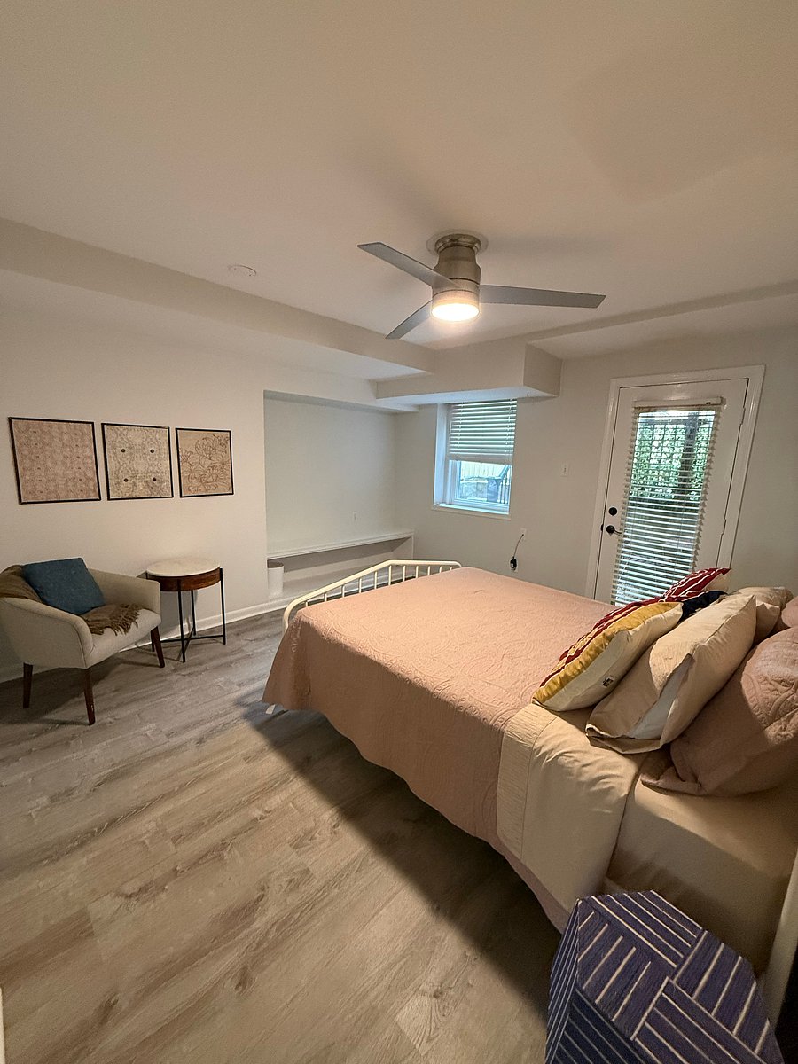 Spacious bedroom with queen-size bed. All sheets and bedding included.
