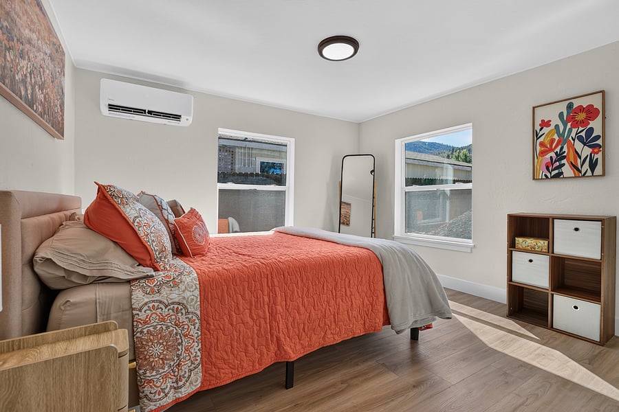 Queen bed with new Nectar Premier Memory Foam Mattress, bamboo linens, and custom room-darkening shades.