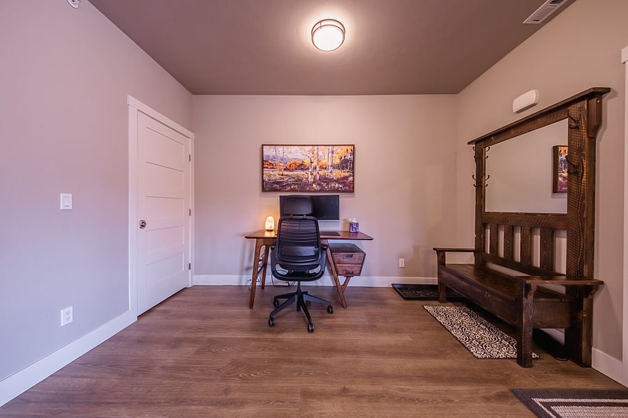 Dedicated work space are with Steel Case ergonomic chair. Also, an entryway bench with coat rack.