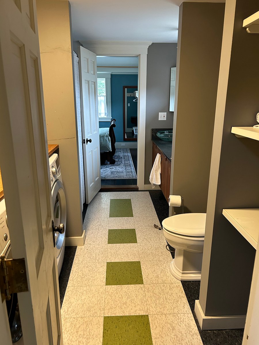 Shared bathroom for apartments 1 and 2 (shower out of frame)