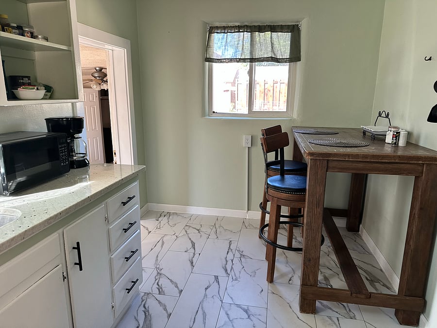 Stocked Kitchener ready for you to be the chef. View from the living room. Laundry room to the right and den to the left.
