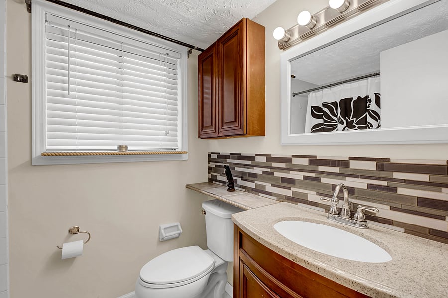 Clean full bathroom with [tub/shower]. Fresh towels are provided.
