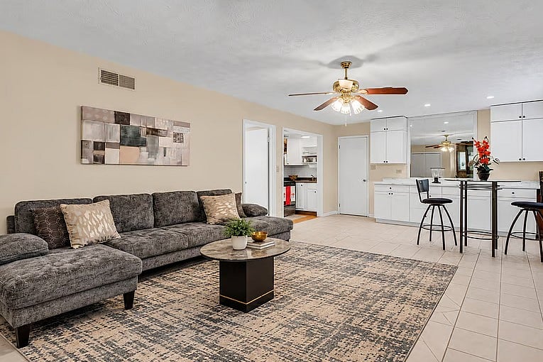 Open layout: the living area flows right into the kitchen and breakfast bar.