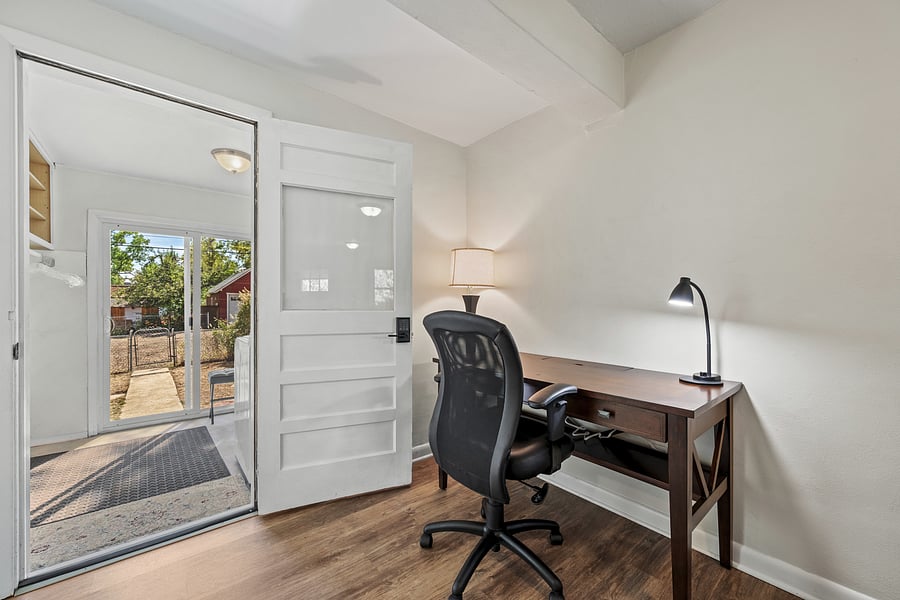 Home office with task lighting and a built in power strip to eliminate cord hassle.