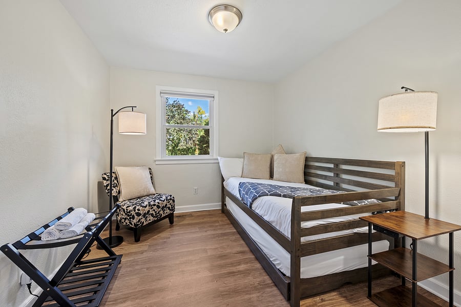 Trundle bed pops up to regular height.