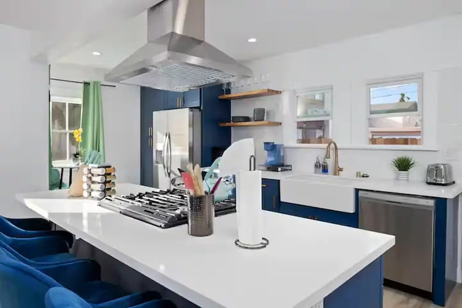 Beautiful modern kitchen with stainless steel appliances and farmhouse sink