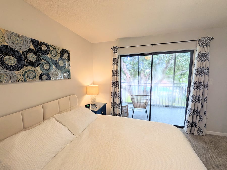 Primary Bedroom with comfortable queen bed and large closet space.  Smart LCD TV available in the room.