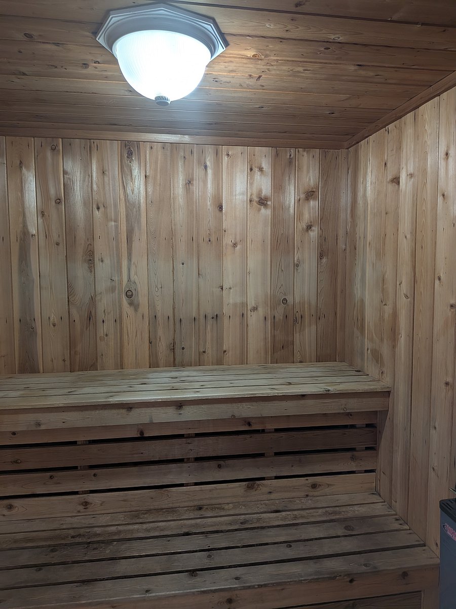 Large sauna adjacent to the pool and hot tub.