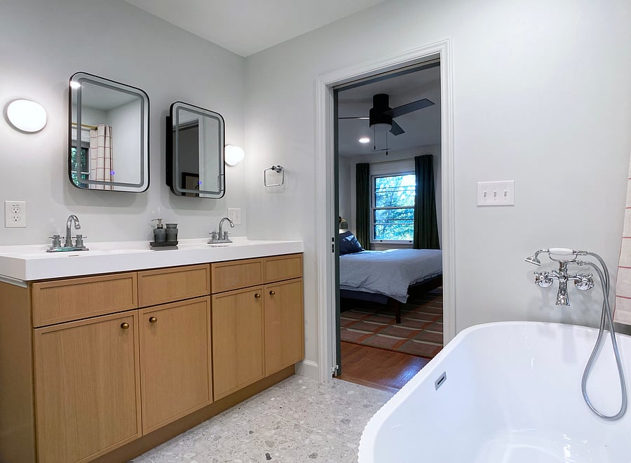 Ensuite bath with walk-in shower, soaking tub, and double vanity.