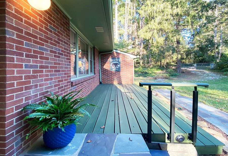 Front porch and entryway. Front door enters into the living room.