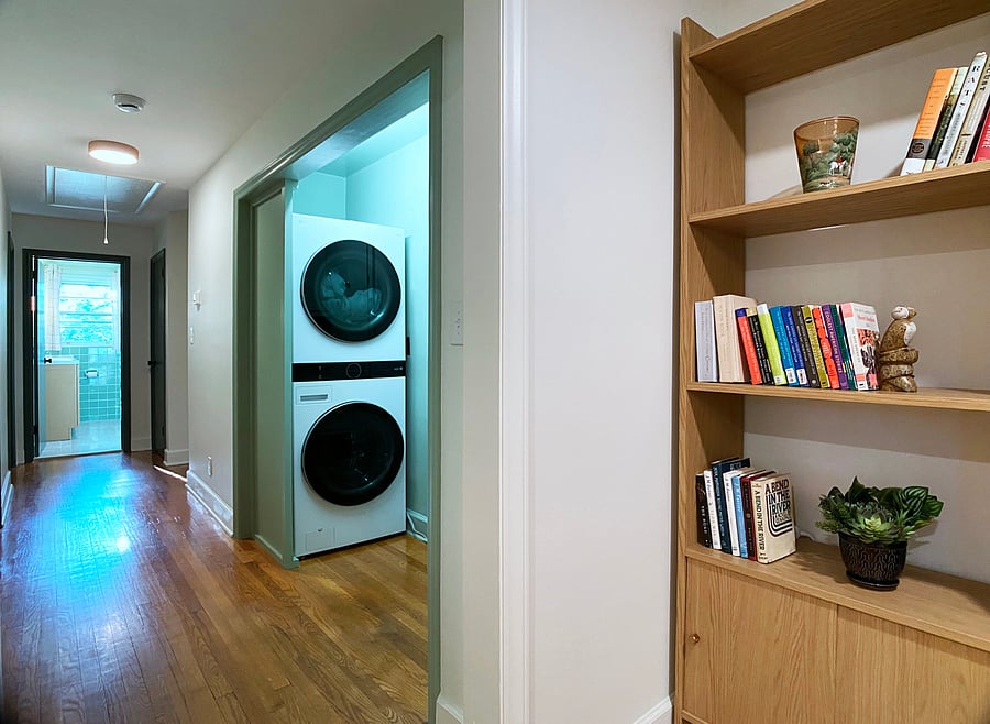 Laundry with iron & ironing board.