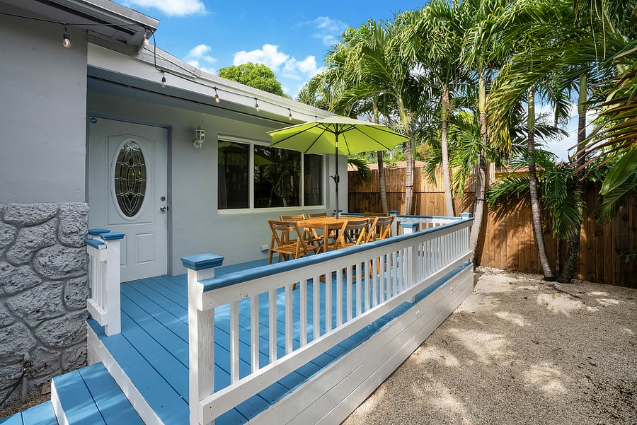 Front outdoor deck with entrance to Florida room.
