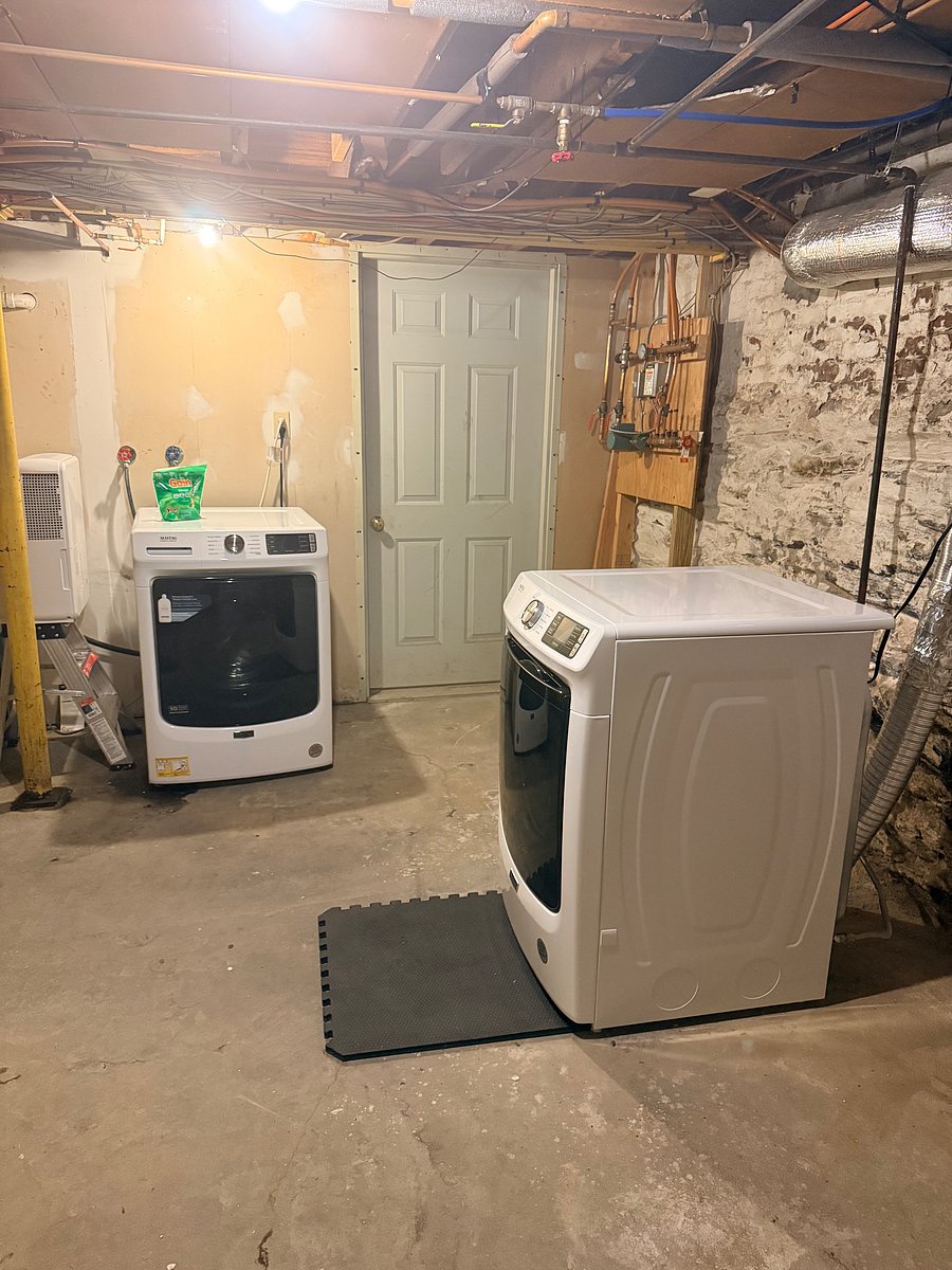 HE washer and dryer in the basement;