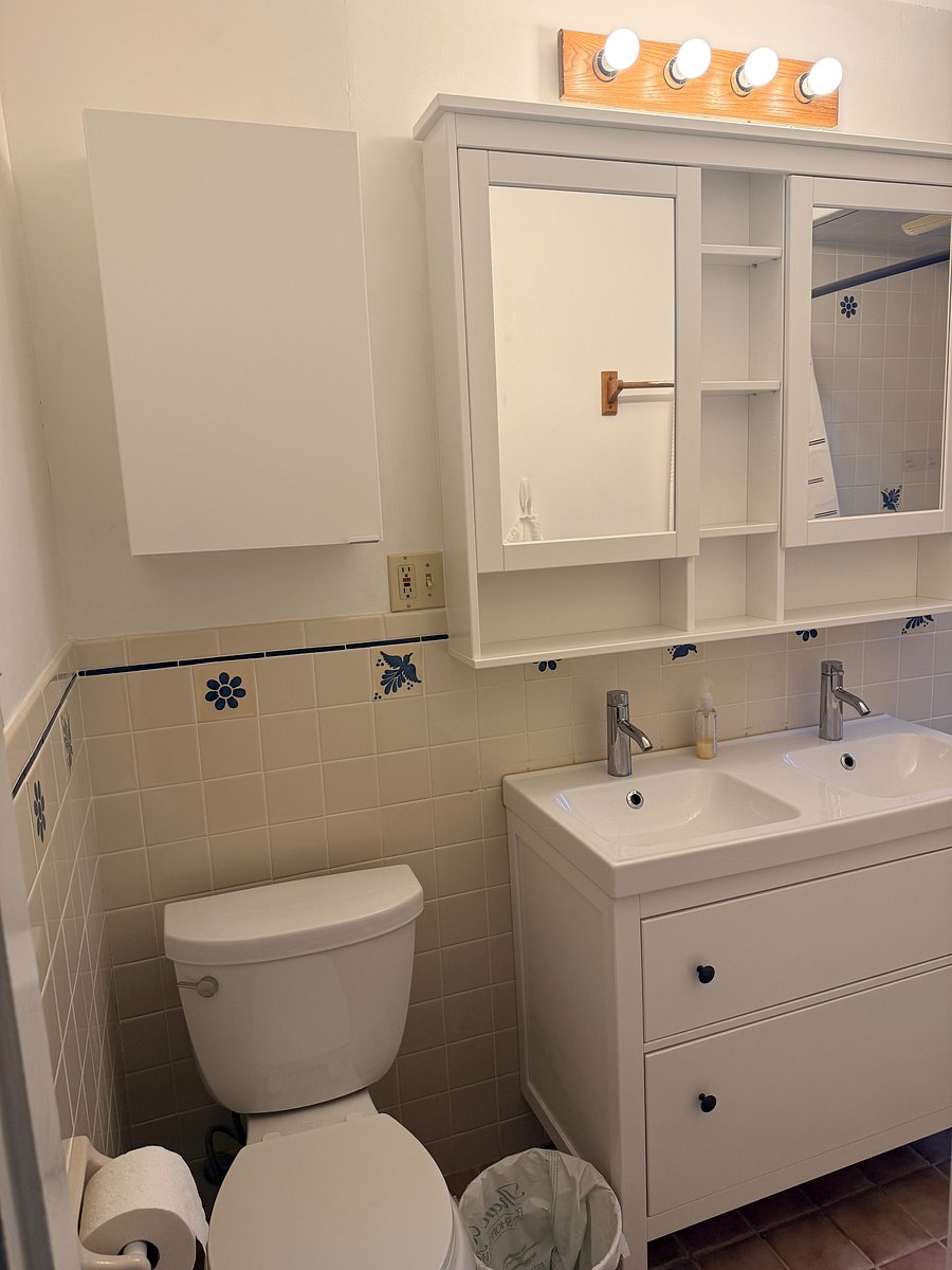 dual-sink bathroom vanity with lots of functional storage