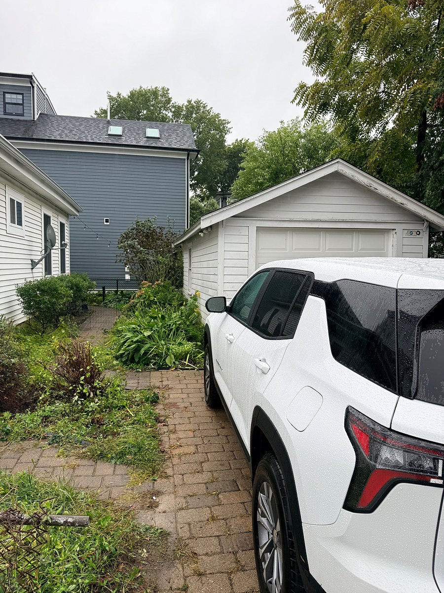 one off-street parking spot next to the back entrance; Additional storage space inside the garage (garden tools, bicycles etc.)