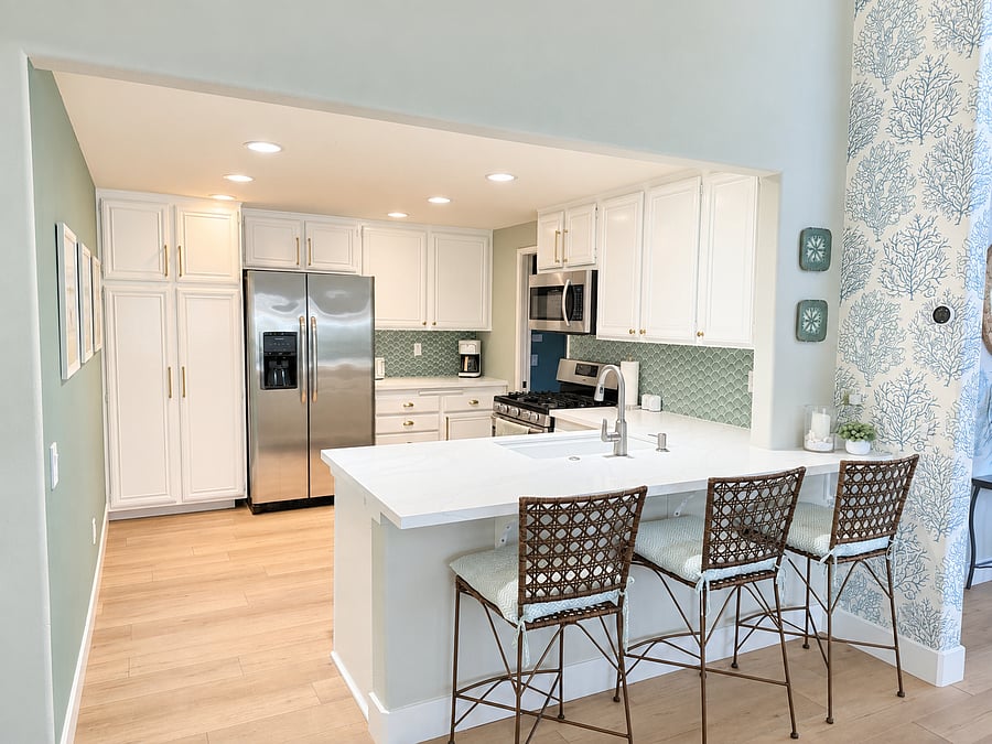 Fully stocked kitchen with stainless steel appliances
