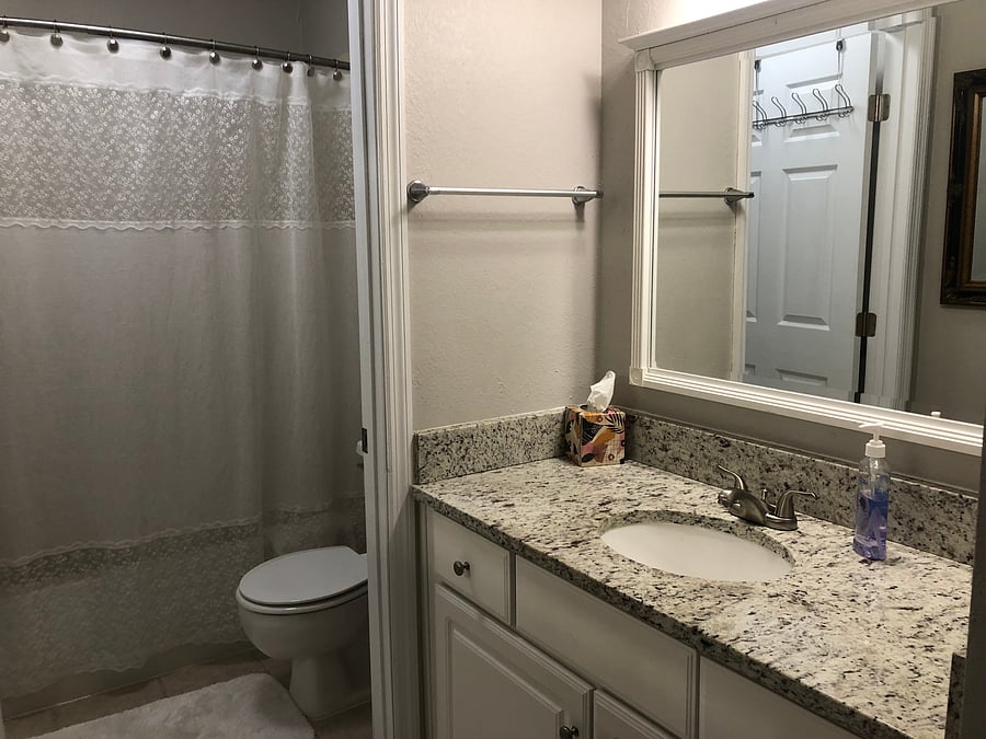 PRIVATE WATER CLOSET (SHOWER TUB AND TOILET) AND GROOMING BASIN. DIRECTLY OFF THE MASTER BEDROOM.