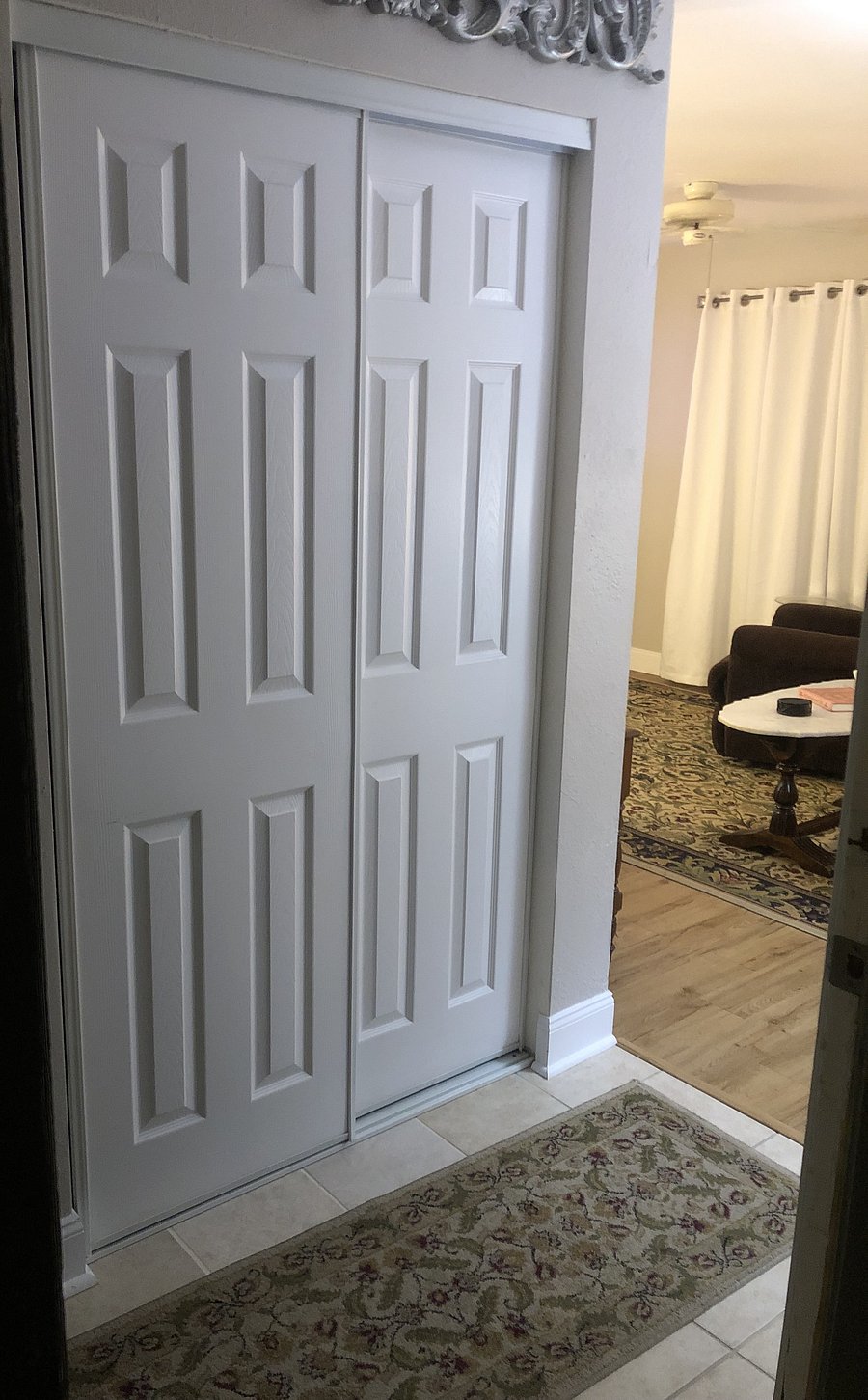 EXTRA STORAGE IN THE FOYER,
JUST RIGHT FOR THE WINTER - SUMMER CLOSET SWAP.