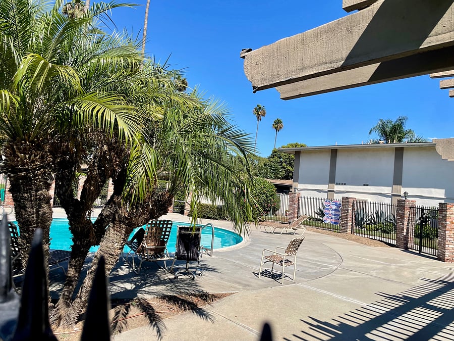 There are 2 pools in the complex with Jacuzzi and chairs