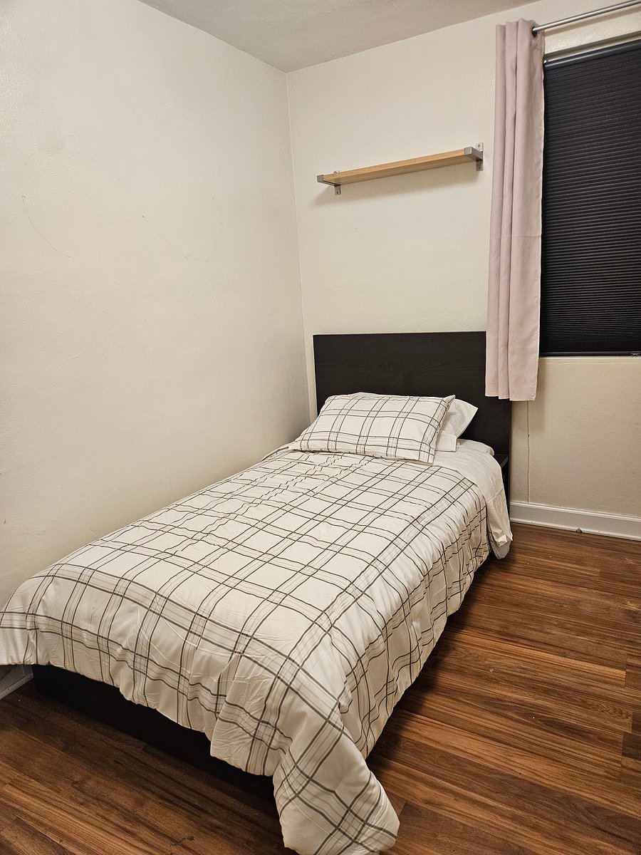 Available bedroom twin size bed and work desk.