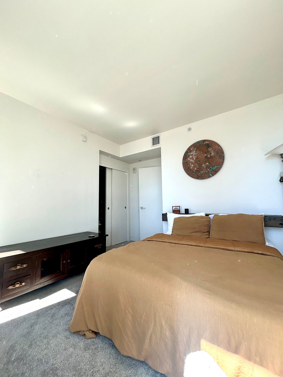 Your bedroom with Queen Bed and storage cabinet!