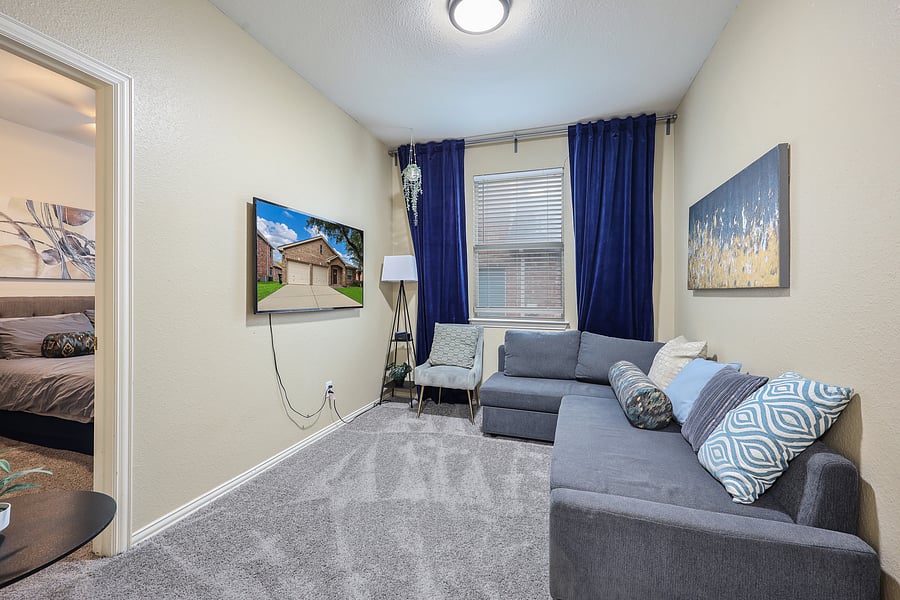 Separate sitting/TV room provides additional space for relaxing and entertainment.