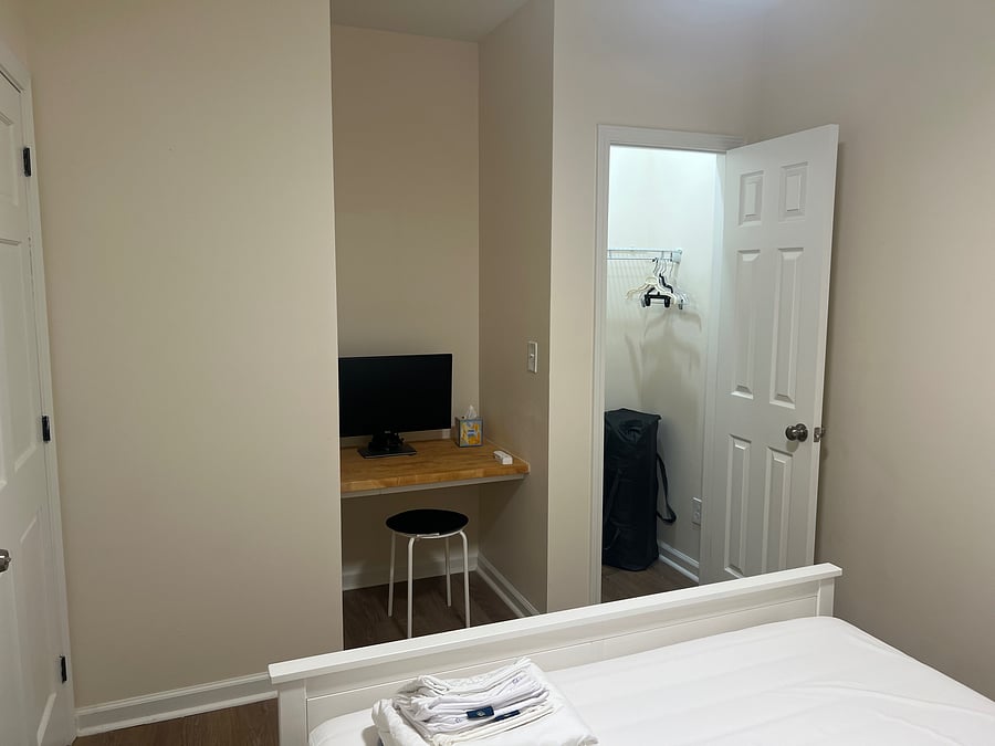 Work station in bedroom. Closet for storage will provide dresser upon request
