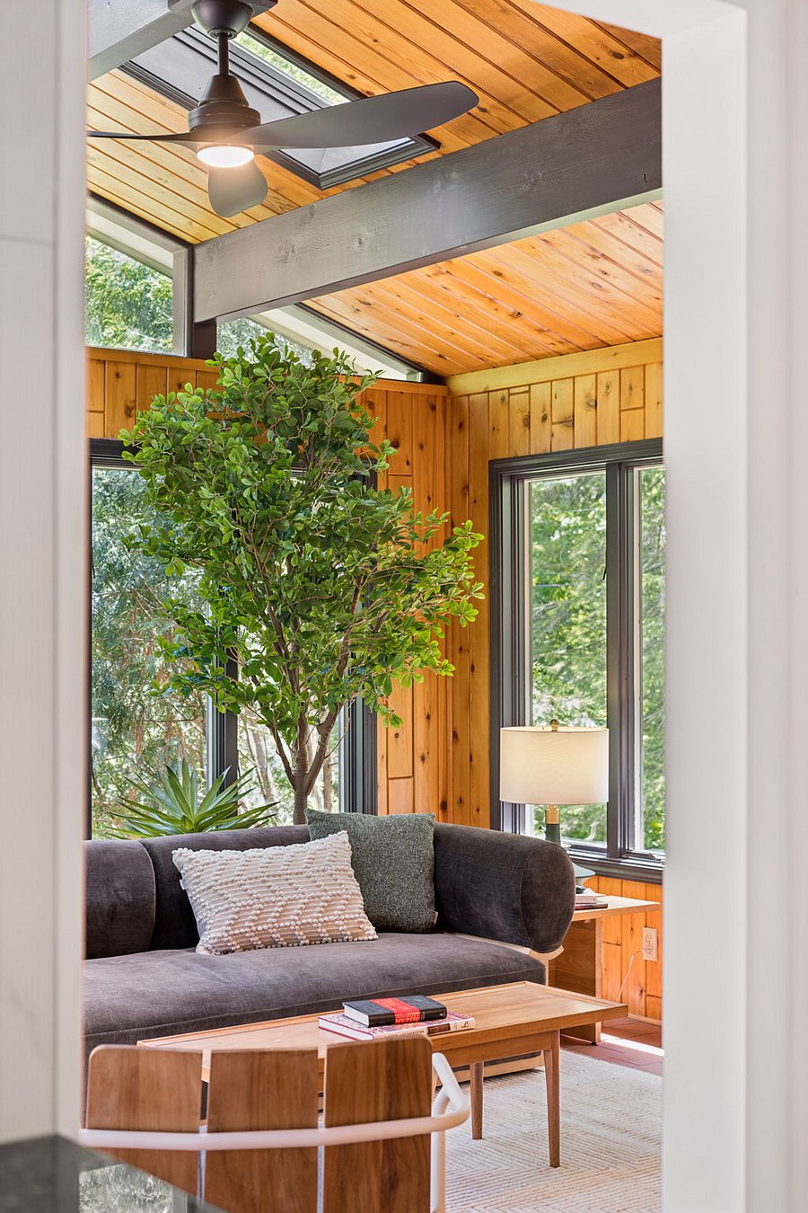Whether you're curling up with a book and coffee, connecting with friends, or playing family games together, the updated sun room is one of the most beautiful spaces in this home!