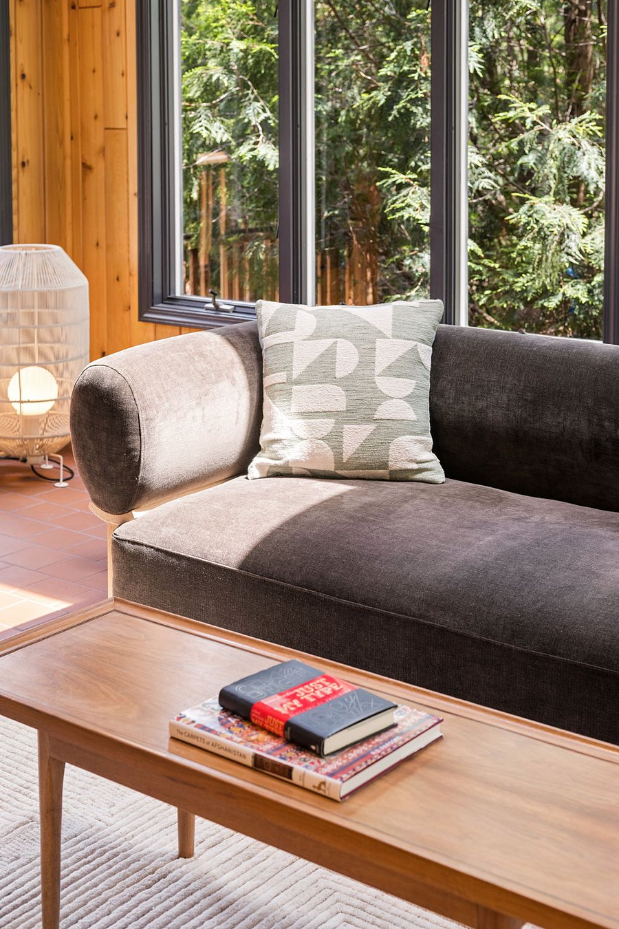 Curl up with a good book on the oversized couch in the sun room.