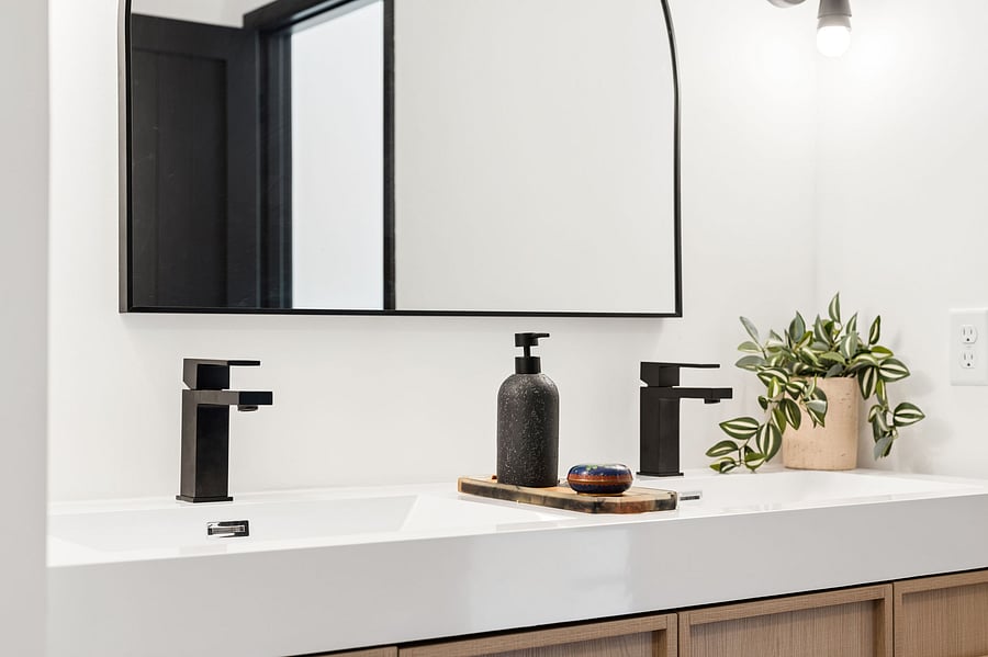 Double vanity sinks in the primary ensuite bathroom.