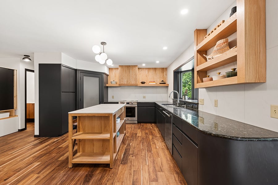 Ample storage, excellent workspaces, and room to entertain guests - the large updated kitchen can do it all!